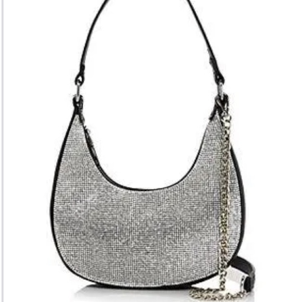 Aqua sparkling shoulder bag can be worn also as a crossbody bad.